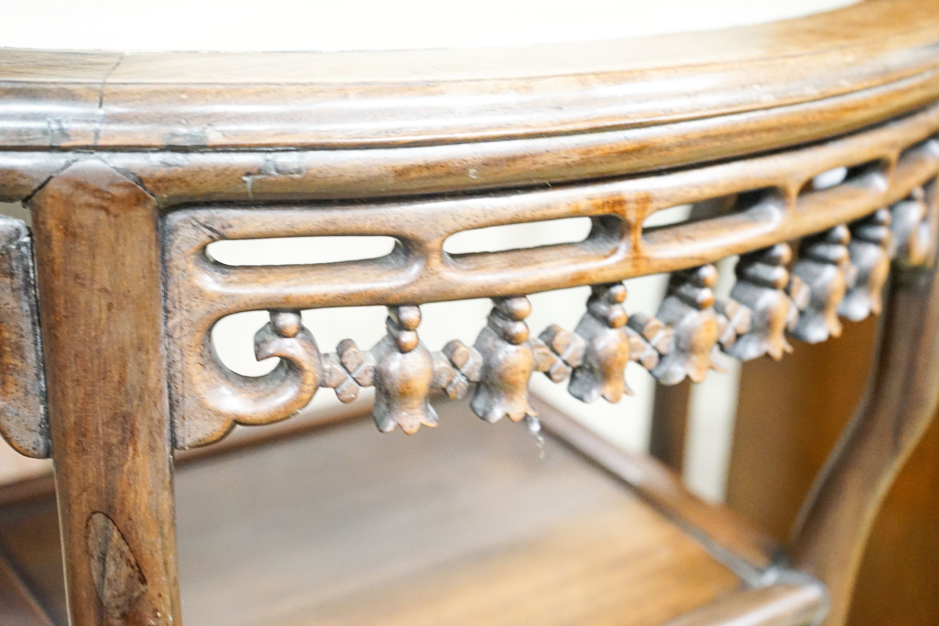 A pair of Chinese marble-topped demi lune console tables, width 82cm, depth 40cm, height 80cm